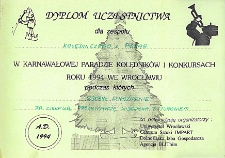 Dyplom za uczestnictwo i wyróżnienie dla zespołu kolędniczego z Piekar w Karnawałowej Paradzie Kolędników we Wrocławiu, zorganizowanej we Wrocławiu przez Uniwersytet Wrocławski, Fundację „Universitas”, Centrum Sztuki „Impart”, Dolnośląską Izbę Gospodarczą, Agencję BLIThim, z udziałem zespołu kolędniczego z Piekar, 22.01.1994 r.